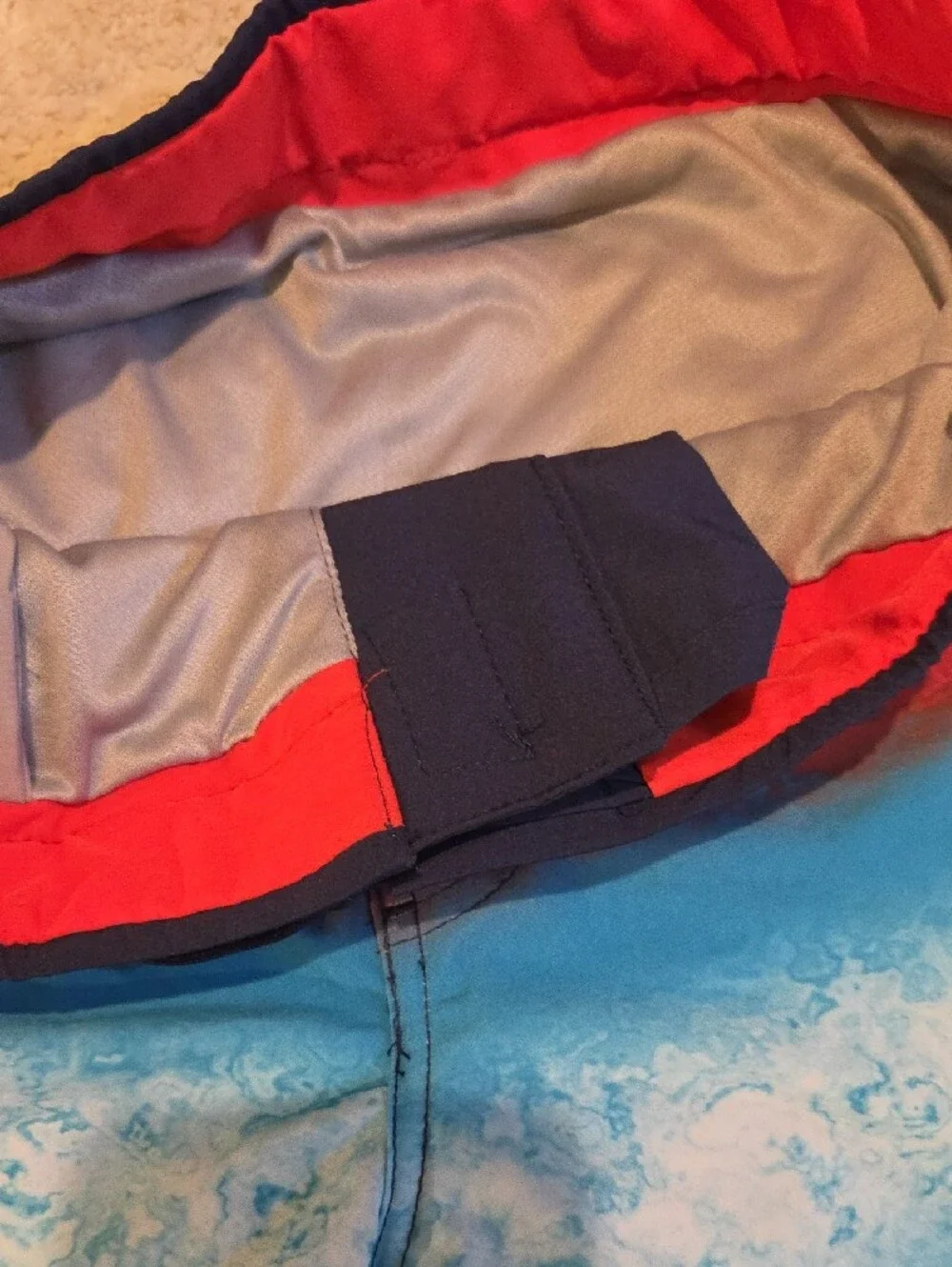 ZeroXposur Men's Blue Gradient Swim Board Shorts with Red Accent
